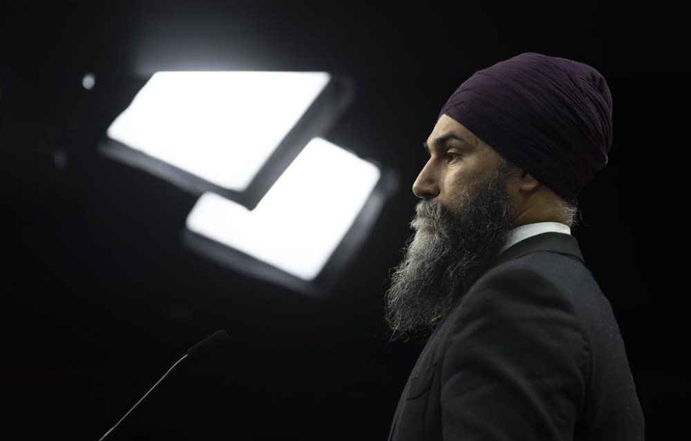 New Democratic Party leader Jagmeet Singh listens to a question during an availability on Parliament Hill, Thursday, January 19, 2023 in Ottawa. New Democrat Leader Jagmeet Singh says it will be a deal-breaker if the Liberal government doesn't introduce a pharmacare bill in Parliament this year. THE CANADIAN PRESS/Adrian Wyld