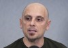 An emotional Sandro Grande, former reserve team coach for CF Montreal, speaks to the media Thursday, January 19, 2023 in Laval, Que. Grande was fired the day after he was hired for controversial remarks about sovereigntists more than ten years ago. THE CANADIAN PRESS/Ryan Remiorz