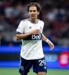 Vancouver Whitecaps' Simon Becher follows the play during the second half of an MLS soccer game against the Houston Dynamo in Vancouver, on Friday, August 5, 2022. Blecher is one of three former Whitecaps FC 2 players who signed MLS deals with Vancouver in November. THE CANADIAN PRESS/Darryl Dyck