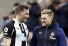 FILE Newcastle United's Chris Wood, left, speaks to Eddie Howe in this March 5, 2022 photo, in Newcastle, England. New Zealand striker Chris Wood is set to join Nottingham Forest on loan from Newcastle. Newcastle manager Eddie Howe confirmed that Wood was completing a medical with Forest on Friday, Jan. 20, 2023. (Richard Sellers/PA via AP, File)