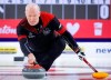 Team Ontario skip Glenn Howard makes a shot as he plays Team Wild Card Two at the Tim Hortons Brier in Lethbridge, Alta., Saturday, March 5, 2022. Feeling 