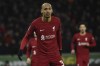 Liverpool's Fabinho, left, stands on the pitch during the English FA Cup 3rd round replay soccer match between Wolverhampton Wanderers and Liverpool at Molineux stadium in Wolverhampton, England, Tuesday Jan. 17, 2023. (AP Photo/Rui Vieira)