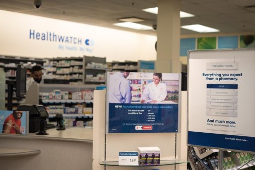 Signage explaining that Ontario pharmacists are able to provide prescriptions for minor health conditions is photographed at a Shoppers Drug Mart pharmacy in Etobicoke, Ont., on Wednesday, January 11, 2023. Ontario pharmacists' new ability to assess and write prescriptions for conditions such as pink eye and uncomplicated urinary tract infections has led some doctors to express concern. THE CANADIAN PRESS/ Tijana Martin