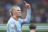 Manchester City's Erling Haaland celebrates after scoring his side's opening goal during the English Premier League soccer match between Manchester City and Wolverhampton at the Etihad Stadium in Manchester, England, Sunday, Jan. 22, 2023. (AP Photo/Dave Thompson)