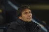 Tottenham's head coach Antonio Conte attends the start of the English Premier League soccer match between Manchester City and Tottenham Hotspur at the Etihad Stadium in Manchester, England, Thursday, Jan. 19, 2023. (AP Photo/Dave Thompson)