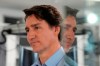 As Canada's allies pledge tanks for Ukraine, Prime Minister Justin Trudeau gave no indication Monday morning on whether Ottawa will follow suit. Trudeau is reflected in a glass door as he addresses media after touring Xanadu Quantum Technologies in Toronto, Monday, Jan.23, 2023. THE CANADIAN PRESS/Frank Gunn