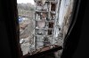 A view of an apartment building, damaged during a heavy fighting, in Mariupol, in Russian-controlled Donetsk region, eastern Ukraine, Thursday, Jan. 5, 2023. (AP Photo/Alexei Alexandrov)
