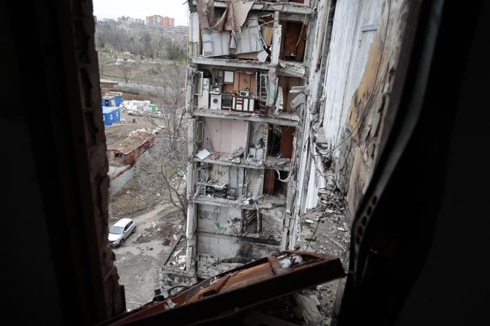 A view of an apartment building, damaged during a heavy fighting, in Mariupol, in Russian-controlled Donetsk region, eastern Ukraine, Thursday, Jan. 5, 2023. (AP Photo/Alexei Alexandrov)