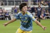 FILE - Philadelphia Union midfielder Paxten Aaronson (30) celebrates after scoring a goal during the second half of an MLS soccer match against FC Cincinnati Saturday, Oct. 9, 2021, in Cincinnati. Aaronson is among 13 players who could make their U.S. national team debuts under interim coach Anthony Hudson in exhibitions against Serbia on Jan. 25 and Colombia three days later. (AP Photo/Jeff Dean, File)