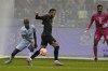 PSG's Neymar controls the ball as he plays against a combined XI of Saudi Arabian teams Al Nassr and Al Hilal during a friendly soccer match, at the King Saud University Stadium, in Riyadh, Saudi Arabia, Thursday, Jan. 19, 2023. (AP Photo/Hussein Malla)
