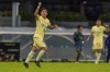 FILE - America's Alejandro Zendejas celebrates scoring against Tigres during a Mexican soccer league match at Azteca stadium in Mexico City, Saturday, Sept. 3, 2022. Zendejas, a 24-year-old forward who played twice for Mexico, is among 13 players who could make their U.S. national team debuts under interim coach Anthony Hudson in exhibitions against Serbia on Jan. 25 and Colombia three days later. (AP Photo/Eduardo Verdugo, File)