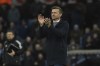 Leeds United's head coach Jesse Marsch applauds his teams traveling fans after the end of the English Premier League soccer match between Aston Villa and Leeds United at Villa Park in Birmingham, England, Friday, Jan. 13, 2023. Villa won the game 2-1. (AP Photo/Rui Vieira)
