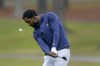 FILE - North Carolina A&T's J.R. Smith chips from the 17th fairway during the first round of the Phoenix Invitational golf tournament in Burlington, N.C., Oct. 11, 2021. Smith, a former NBA player, hopes his journey to become a college golfer helps others feel comfortable taking up the sport regardless of their background. Smith is part of a new video podcast launching Wednesday designed to make the sport more accessible to young and diverse audiences. (AP Photo/Gerry Broome, File)