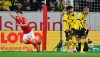 25 January 2023, Rhineland-Palatinate, Mainz: Soccer: , FSV Mainz 05 - Borussia Dortmund, Matchday 17, Jae-Sung Lee from Mainz, left, celebrates scoring during the Bundesliga soccer match between Mainz and Borussia Dortmund at Mewa Arena, Mainz, Germany, Wednesday Jan. 25, 2023. (Torsten Silz/dpa via AP)