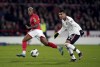 Nottingham Forest's Danilo and Manchester United's Casemiro, right, battle for the ball during the English League Cup semi-final, first leg soccer match at the City Ground, Nottingham, England, Wednesday, Jan. 25 2023. (Tim Goode/PA via AP)