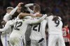 Real Madrid's team players celebrate after Toni Kroos scored his side's second goal during the Spanish La Liga soccer match between Athletic Club Bilbao and Real Madrid at the San Mames stadium in Bilbao, Spain, Sunday, Jan. 22, 2023. (AP Photo/Alvaro Barrientos)