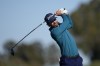 Sam Ryder hits his tee shot on the 18th hole of the North Course at Torrey Pines during the first round of the Farmers Insurance Open golf tournament, Wednesday, Jan. 25, 2023, in San Diego. (AP Photo/Gregory Bull)