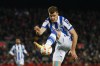 Real Sociedad's Alexander Sorloth controls he ball during the Spanish Copa del Rey soccer match between Barcelona and Real Sociedad at the Camp Nou stadium, in Barcelona, Spain, Wednesday, Jan. 25, 2023. (AP Photo/Joan Monfort)