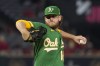 FILE - Oakland Athletics starting pitcher Cole Irvin throws to the plate during the first inning of a baseball game against the Los Angeles Angels on Sept. 29, 2022, in Anaheim, Calif. The Baltimore Orioles acquired Irvin from the Oakland Athletics on Thursday, Jan. 26, 2023, along with minor league right-hander Kyle Virbitsky for minor league infielder Darell Hernaiz. (AP Photo/Mark J. Terrill, File)