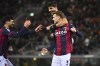 Bologna's Stefan Posch, bottom right, celebrates with teammates after scoring to 1-0 during the Serie A soccer match between Bologna F.C. and Spezia Calcio at Renato Dall'Ara Stadium in Bologna, Italy, Friday Jan. 27, 2023 (Massimo Paolone/LaPresse via AP)