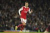 Arsenal's Martin Odegaard runs during the English FA Cup 4th round soccer match between Manchester City and Arsenal at the Etihad Stadium in Manchester, England, Friday, Jan. 27, 2023. (AP Photo/Dave Thompson)