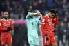 Bayern players walk on the pitch at the end of the Bundesliga soccer match between Bayern Munich and Eintracht Frankfurt at the Allianz Arena in Munich, Germany, Saturday, Jan. 28, 2023. (AP Photo/Alexandra Beier)
