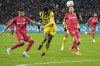 Dortmund's Jude Bellingham, center, heads the ball on gaol during the German Bundesliga soccer match between Bayer Leverkusen and Borussia Dortmund at the BayArena in Leverkusen, Germany, Germany, Sunday, Jan. 29, 2023. (AP Photo/Martin Meissner)