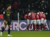 Reims' Folarin Balogun celebrates with teammates after scoring his side's opening goal during the French League One soccer match between Paris Saint-Germain and Reims at the Parc des Princes in Paris, Sunday, Jan. 29, 2023. (AP Photo/Thibault Camus)