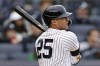 FILE - New York Yankees' Gleyber Torres watches his RBI-double during the first inning of a baseball game against the Baltimore Orioles, Oct. 1, 2022, in New York. The Yankees have agreed to a $9.95 million, one-year contract with Torres, avoiding an arbitration hearing with the infielder by agreeing at the midpoint of proposed salaries. The team announced the deal on Sunday, Jan. 29, 2023. (AP Photo/Adam Hunger, File)