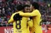 Barcelona's Pedri, left back to the camera, celebrates after scoring the opening goal during the Spanish La Liga soccer match between Girona and FC Barcelona at the Montilivi stadium in Girona, Spain, Saturday, Jan. 28, 2023. (AP Photo/Joan Monfort)