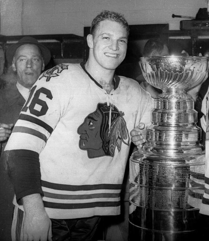 THE CANADIAN PRESS / THE ASSOCIATED PRESS
In this April 16, 1961, file photo, Chicago Blackhawks hockey player Bobby Hull smiles in the dressing room beside the Stanley Cup after Chicago defeated the Detroit Red Wings, 5-1, to win the NHL Championship, in Detroit.