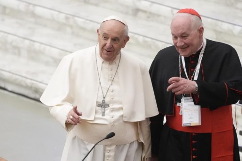 Pope Francis, left, and Cardinal Marc Ouellet arrive at the opening of a three-day Symposium on Vocations in the Paul VI hall at the Vatican, Thursday, Feb. 17, 2022. Marc Ouellet, the Quebec cardinal who oversaw the Vatican's powerful bishops' office and has been recently been hit with accusations of sexual misconduct, announced Monday he will retire in a few months time. THE CANADIAN PRESS/AP-Gregorio Borgia