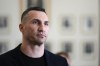 FILE - Former heavyweight boxing world champion Wladimir Klitschko leaves after a meeting with German Economy and Climate Minister Robert Habeck in Berlin, March 31, 2022. Olympic gold medalist Wladimir Klitschko has joined Ukraine’s fight against IOC plans to let some Russians compete at the 2024 Paris Summer Games, it was announced Tuesday, Jan. 31, 2023. The former heavyweight world champion has suggested in a video message sports leaders will be accomplices to the war if athletes from Russia and its military ally Belarus can compete at the next Olympics. (AP Photo/Markus Schreiber, file)