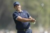 Patrick Reed of the U.S. follows his ball on the 16th hole during the final round of the Dubai Desert Classic, in Dubai, United Arab Emirates, Monday, Jan. 30, 2023. (AP Photo/Kamran Jebreili)