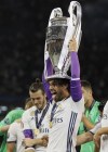 File - Real Madrid's Isco raises the trophy at the end of the Champions League soccer final between Juventus and Real Madrid at the Millennium Stadium in Cardiff, Wales, Saturday, June 3, 2017. Bundesliga club Union Berlin was reportedly on the verge of tying up an unexpected deal for Isco, the Spanish midfielder who won the Champions League five times with Real Madrid. Union hasn’t even played in the competition. (AP Photo/Kirsty Wigglesworth, File)