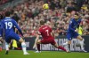 Chelsea's Jorginho passes the ball next to Liverpool's James Milner during the English Premier League soccer match between Liverpool and Chelsea at Anfield stadium in Liverpool, England, Saturday, Jan. 21, 2023. (AP Photo/Jon Super)