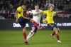 Colombia's Alexis Perez, left, clears the ball in front of United States' Matthew Hoppe (13) and Colombia's Andres Llinas (3) during the second half of an international friendly soccer match Saturday, Jan. 28, 2023, in Carson, Calif. (AP Photo/Marcio Jose Sanchez)