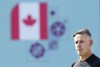 Canada head coach John Herdman watches his team during practice at the World Cup in Doha, Qatar on Monday, November 28, 2022. THE CANADIAN PRESS/Nathan Denette