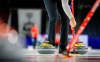 Curling Canada was under fire Wednesday after limiting pregnancy exemption eligibility for teams hoping to add an out-of-province free agent at the national playdowns to just the top five rinks in the rankings. Curlers sweep a stone during a practice session at the Tim Hortons Brier in Lethbridge, Alta., Friday, March 4, 2022. THE CANADIAN PRESS/Jeff McIntosh