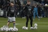 PSG's Kylian Mbappe, right, and PSG's Lionel Messi warm up ahead of the French League One soccer match between Montpellier and Paris Saint-Germain at the State La Mosson stadium in Montpellier, France, Wednesday, Feb. 1, 2023. (AP Photo/Thibault Camus)