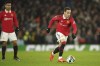 Manchester United's Antony runs with the ball during the English League Cup semifinal second leg soccer match between Manchester United and Nottingham Forest at Old Trafford in Manchester, England, Wednesday, Feb. 1, 2023. (AP Photo/Dave Thompson)