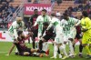 AC Milan's Olivier Giroud, on the pitch, argues with Sassuolo's players during a Serie A soccer match between AC Milan and Sassuolo at the San Siro stadium in Milan, Italy, Sunday, Jan. 29, 2023. (AP Photo/Antonio Calanni)