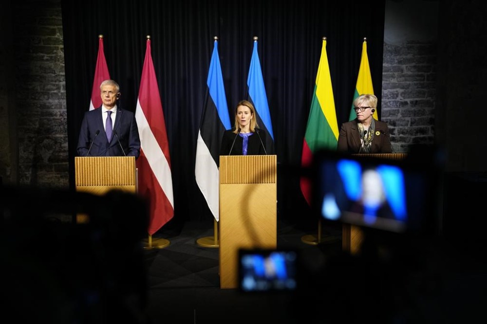 From left, Latvian Prime Minister Krisjanis Karins, Estonian Prime Minister Kaja Kallas and Lithuanian Prime Minister Ingrida Simonyte attend a joint news conference during their meeting in Tallinn, Estonia, Friday, Feb. 3, 2023. The prime ministers of the three Baltic countries meet in Tallinn to discuss, among other things, joint aid efforts for Ukraine. (AP Photo/Pavel Golovkin)