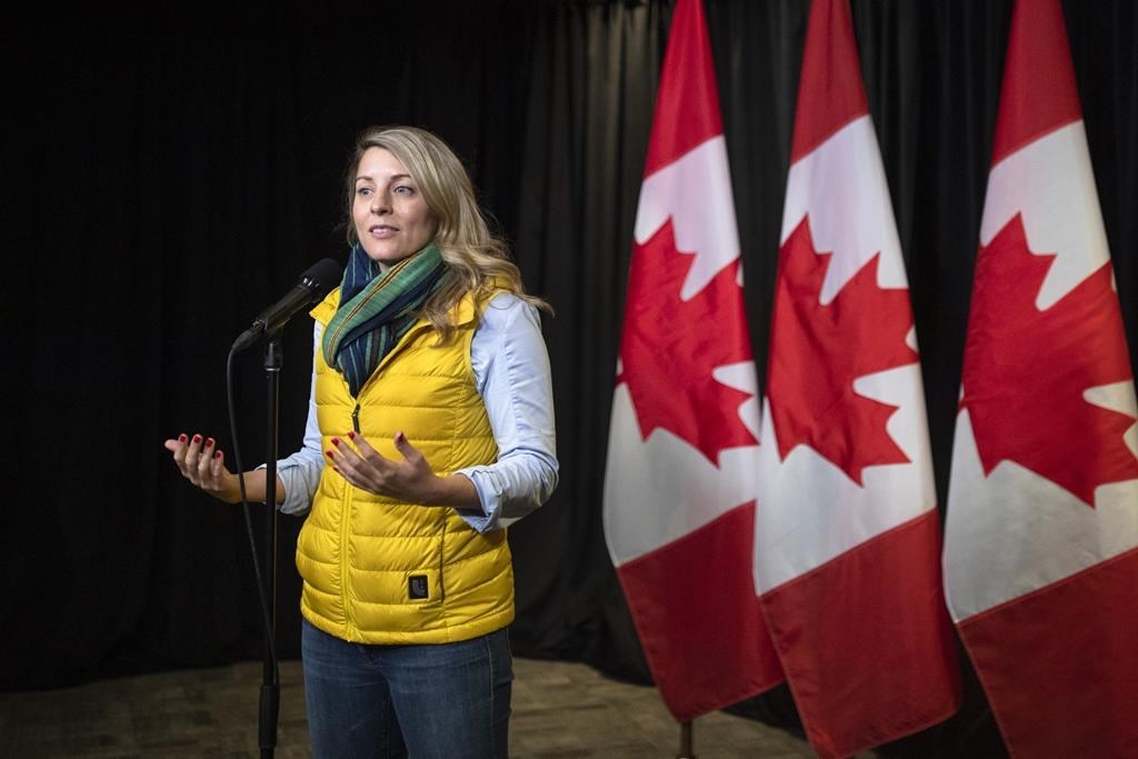 Minister of Foreign Affairs Mélanie Joly speaks to the media at the Hamilton Convention Centre, in Hamilton, Ont. on Tuesday, January 24, 2023. Canada is imposing sanctions against a number of Russian media personalities and companies accused of spreading disinformation about Moscow's invasion of Ukraine. THE CANADIAN PRESS/Nick Iwanyshyn