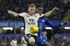 Fulham's Harrison Reed, left, shields the ball from Chelsea's Benoit Badiashile during the English Premier League soccer match between Chelsea and Fulham at Stamford Bridge stadium in London, Friday, Feb. 3, 2023. (AP Photo/Kirsty Wigglesworth)