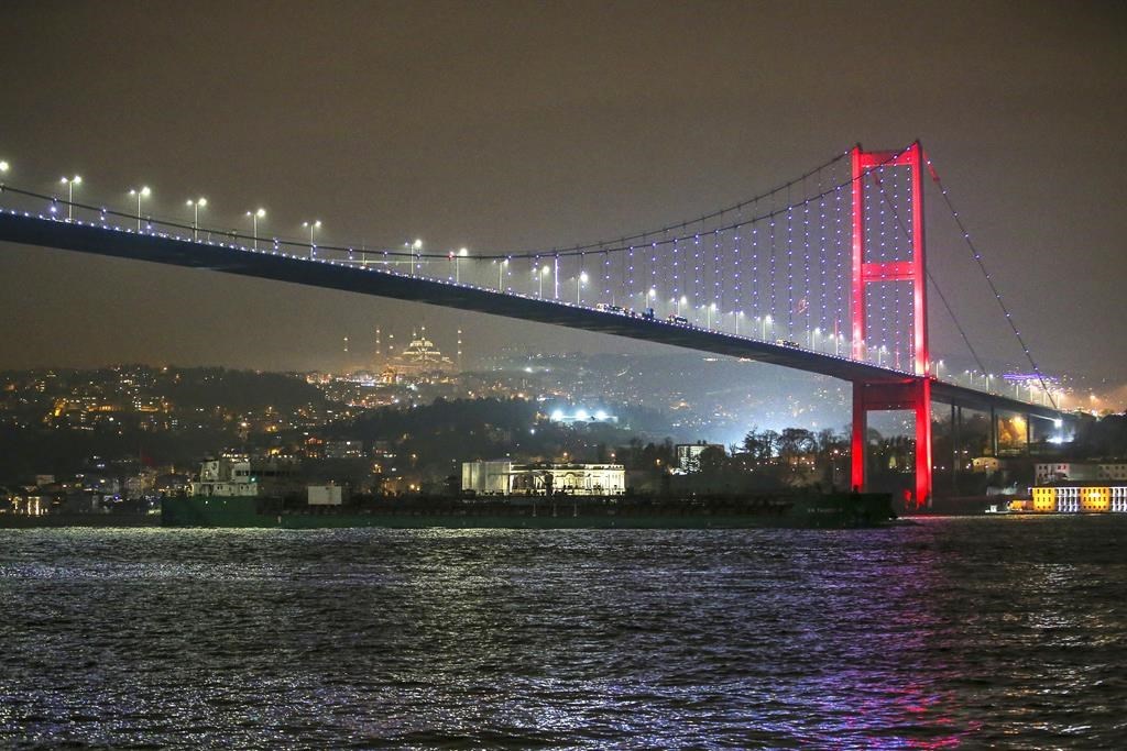 VF Tanker 9 oil tanker ship, which departed from Russian Temryuk port on December 12, sails under the 15 July Martyrs Bridge at the Bosphorus strait in Istanbul, Turkey, Thursday, Dec. 15, 2022.&nbsp;The federal Finance Department says Canada is joining forces with its fellow G-7 countries plus Australia to expand caps on Russian oil to include seaborn petroleum products from that country. THE CANADIAN PRESS/AP-Emrah Gurel