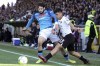 La Spezia's Agudelo, right, fights for the ball with Napoli's Kvaratskhelia during the Serie A soccer match between Spezia Calcio and SSC Napoli at the Alberto Picco stadium in La Spezia, Italy, Sunday Feb. 5, 2023. (Tano Pecoraro/LaPresse via AP)