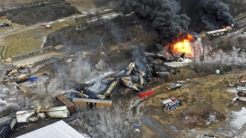 This photo taken with a drone shows portions of a Norfolk and Southern freight train that derailed Friday night in East Palestine, Ohio are still on fire at mid-day Saturday, Feb. 4, 2023. (AP Photo/Gene J. Puskar)