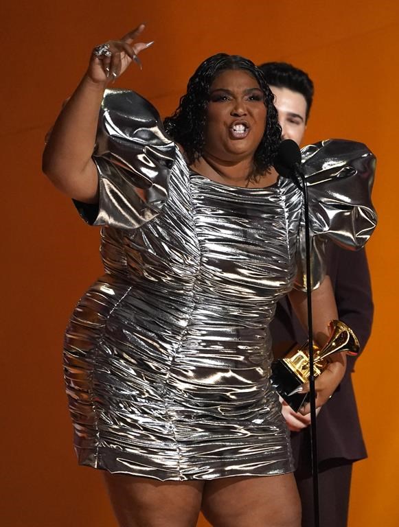 Lizzo accepts the award for record of the year for