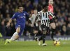 FILE - Chelsea's Pedro, left, and Newcastle United's Christian Atsu vie for the ball during the English Premier League soccer match between Chelsea and Newcastle United at Stamford Bridge stadium in London, on, Jan. 12, 2019. Former Chelsea and Newcastle forward Christian Atsu is missing and believed to be trapped under rubble following the powerful earthquake that struck Turkey on Monday and left more than 2,500 people dead. The Ghana international plays for Turkish club Hatayspor and a club spokesman says he is thought to be in a building that was destroyed. (AP Photo/Matt Dunham, File)